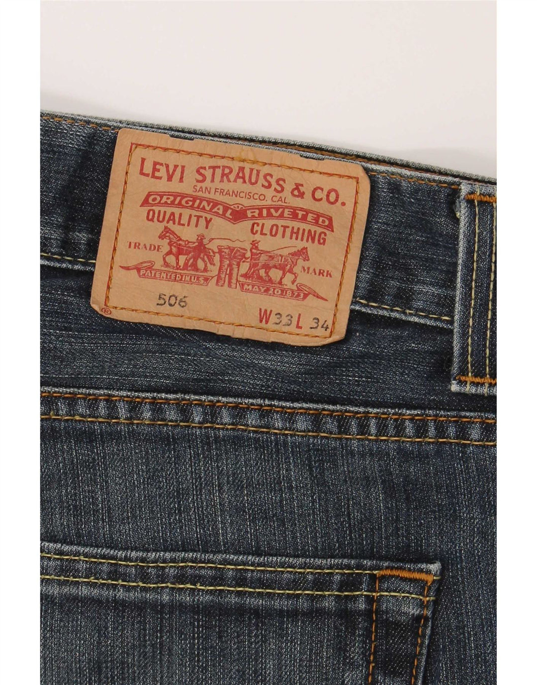 Męskie jeansy Levi's 506 o standardowym kroju W33 L31 Niebieskie