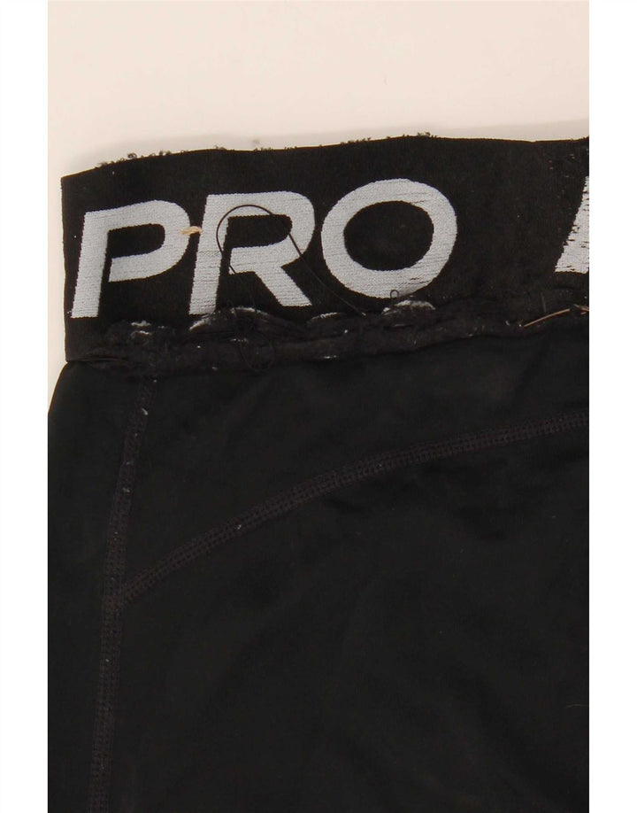 Dziewczęce legginsy z grafiką Nike 13-14 lat, czarny poliester