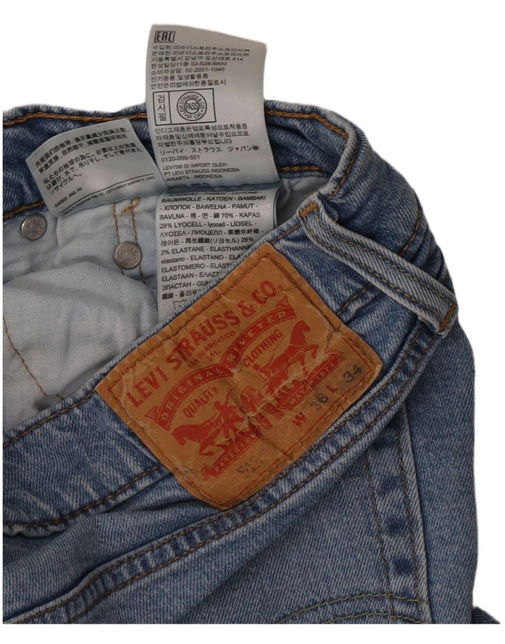 Męskie jeansy Levi's 516 Straight W36 L34 Niebieskie bawełniane