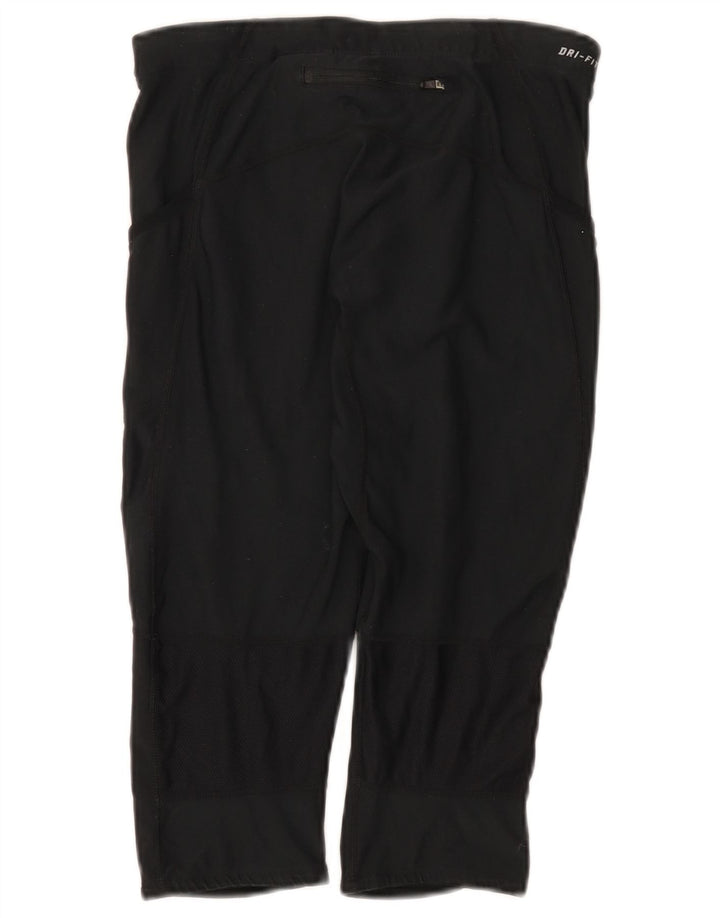 Damskie legginsy Nike Dri Fit Capri UK 12, średni czarny poliester