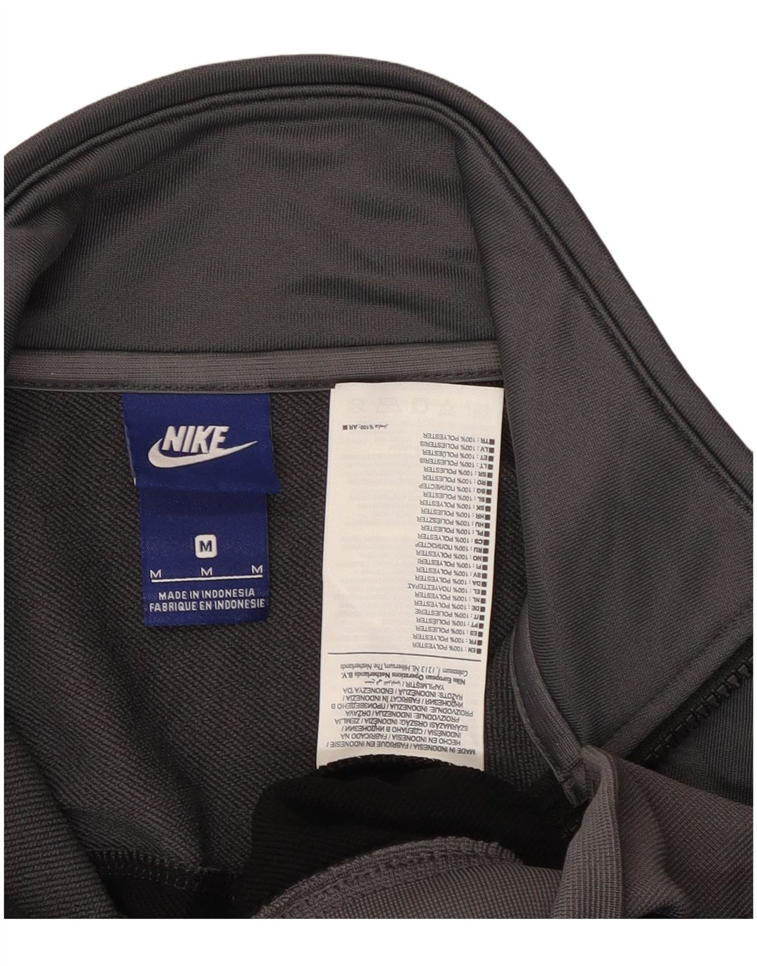 Męska kurtka dresowa Nike, średnia czarna, poliestrowa z blokami kolorów