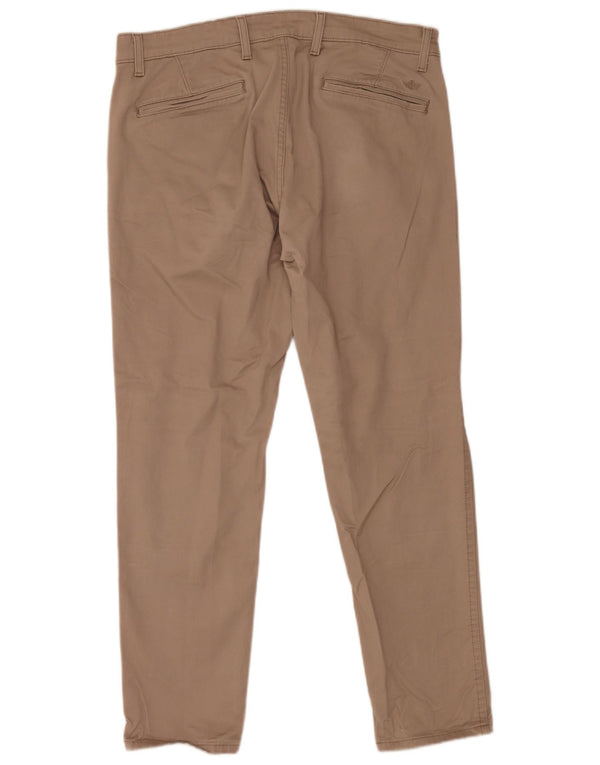 Męskie spodnie typu slim chino Dockers W36 L30 beżowa bawełna