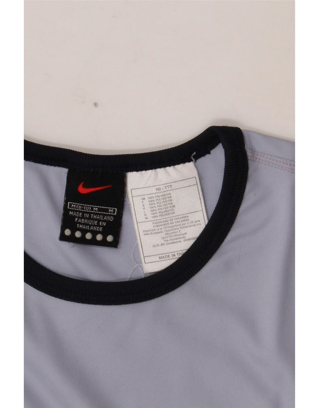 Damski krótki top NIKE z długim rękawem, US 8/10, średni niebieski poliester