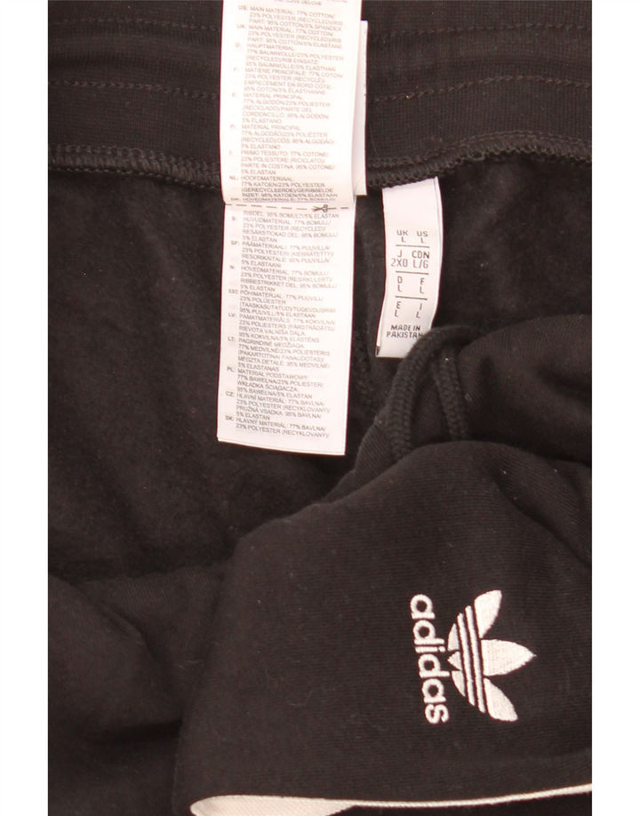 Damskie spodnie dresowe Adidas, duże, czarne, bawełniane