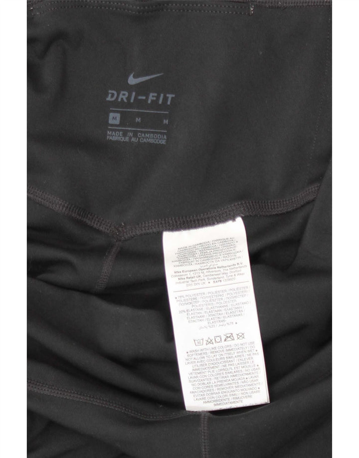 Damskie legginsy Nike Dri Fit Capri UK 12, średni czarny poliester