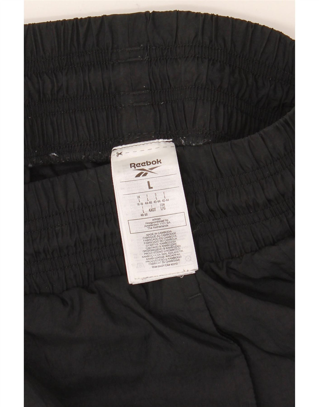 Damskie spodnie dresowe Reebok UK 16/18, duże, czarne, poliamidowe