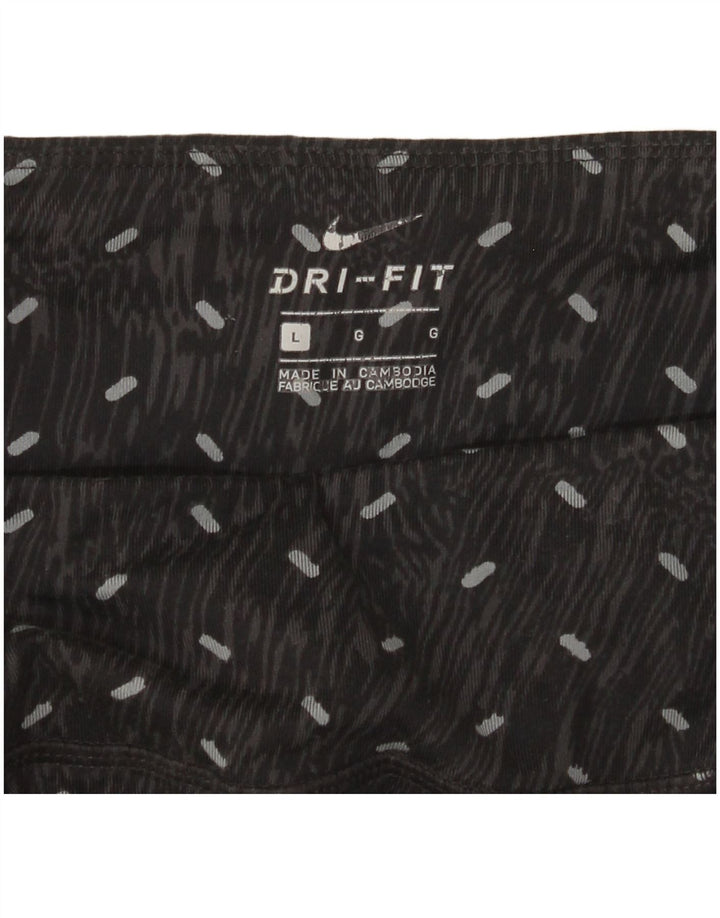 Damskie legginsy Nike Dri Fit UK 14, duże, czarne w cętki