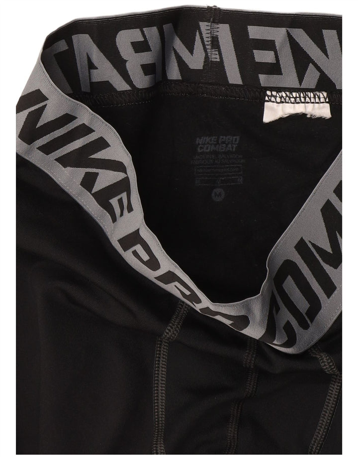 Męskie legginsy z grafiką Nike, średnie czarne
