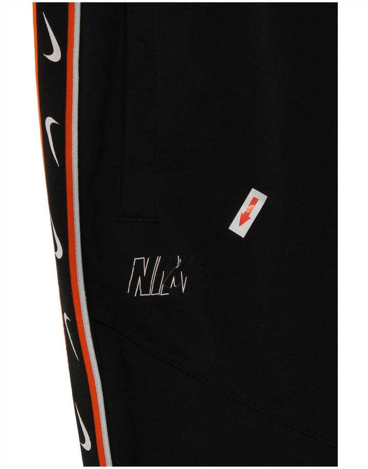 Damskie spodnie dresowe Nike Graphic Joggers UK 14 Średni czarny poliester