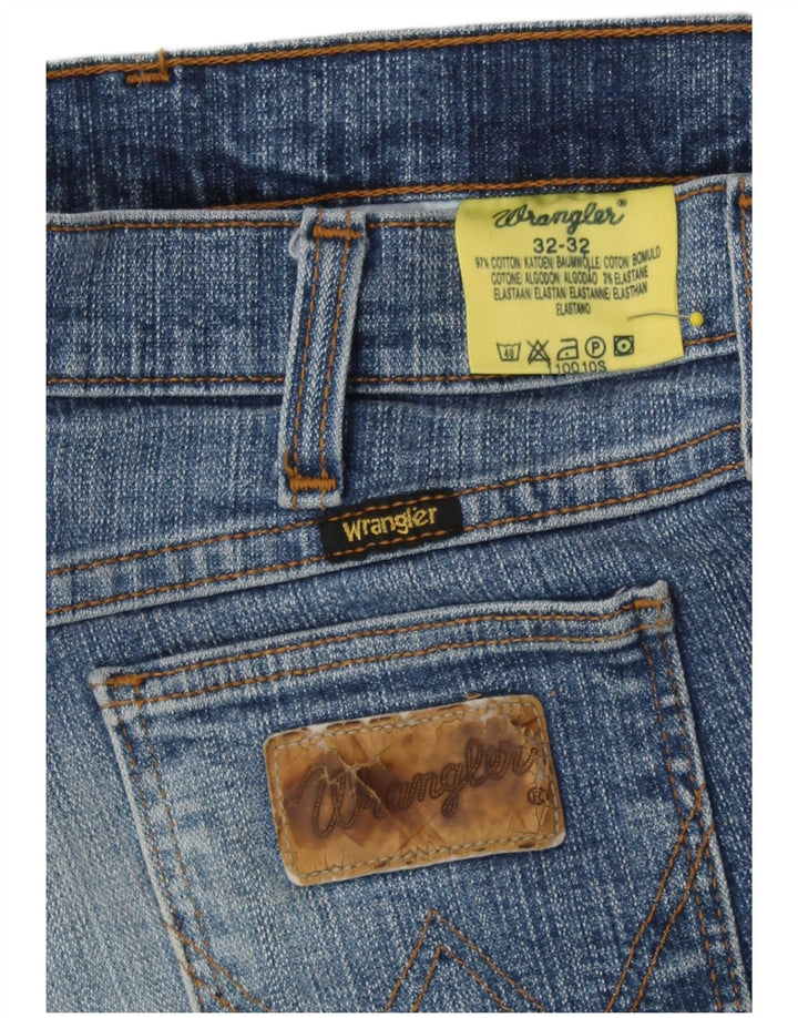 Damskie jeansy rozkloszowane Wrangler W32 L32 niebieskie
