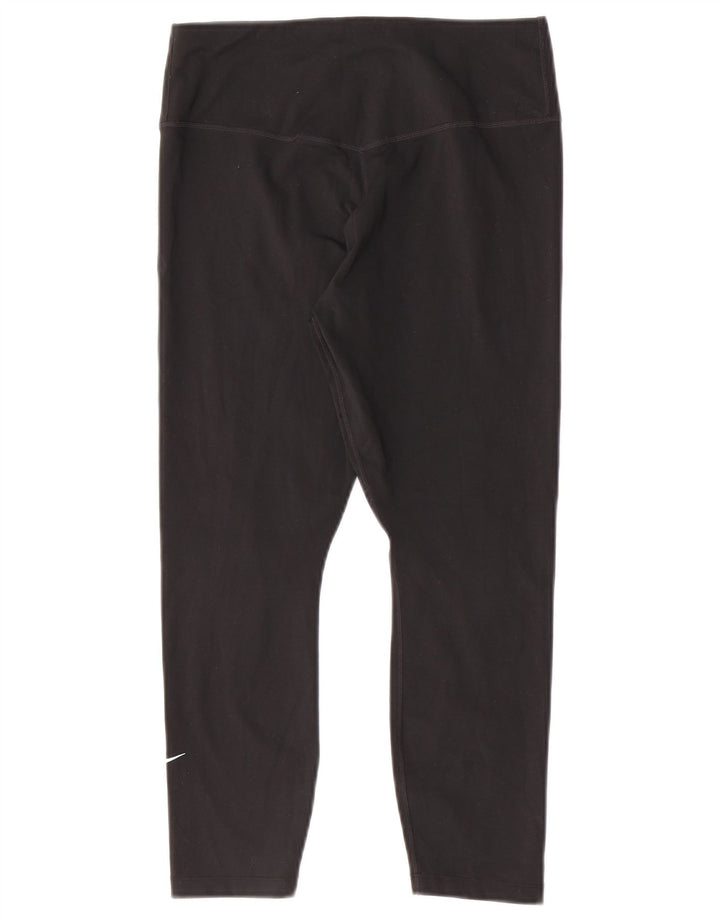 Damskie legginsy Nike Dri Fit Capri UK 12, średni czarny poliester