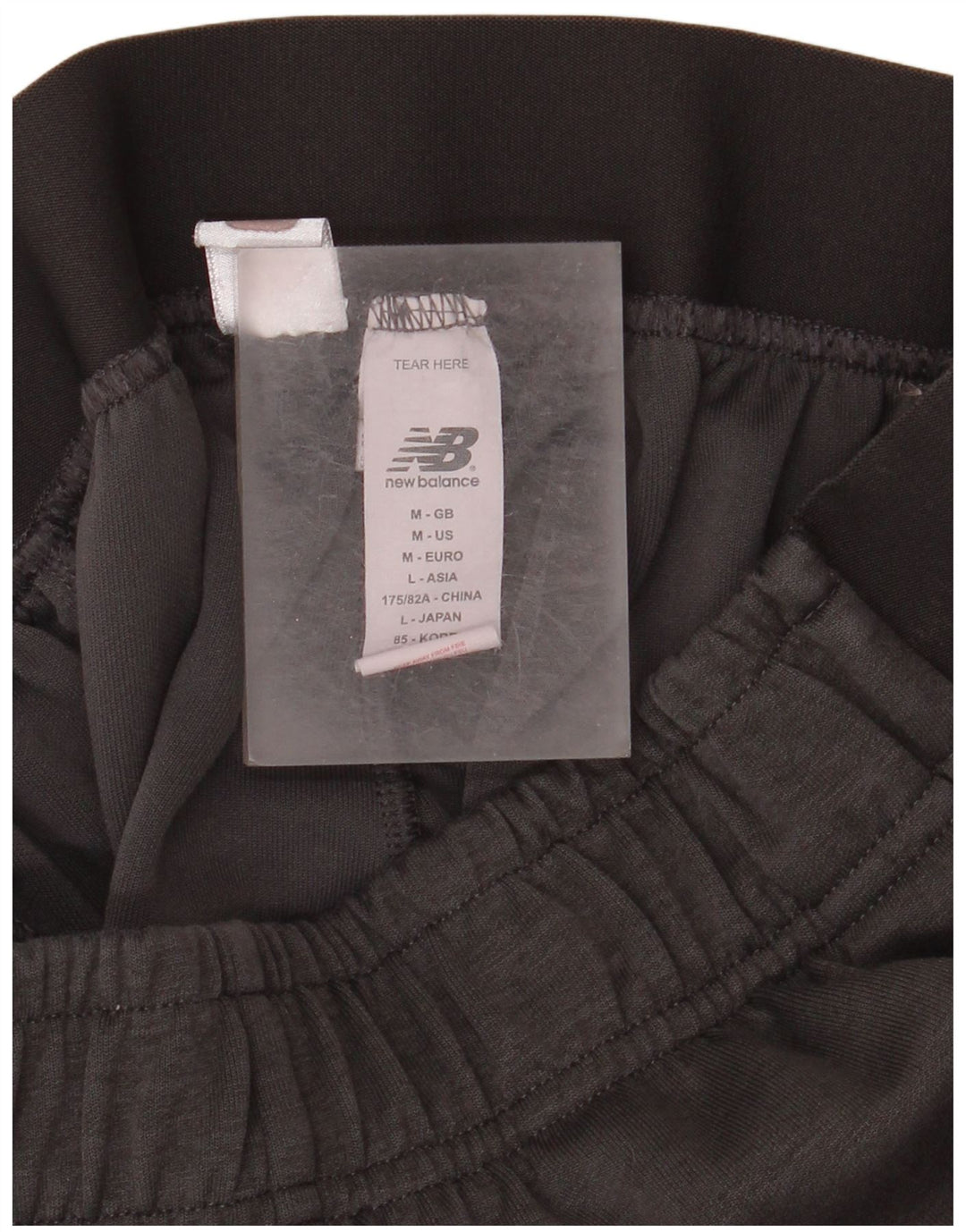 Męskie spodnie dresowe New Balance Liverpool, średnioszary, poliestrowy