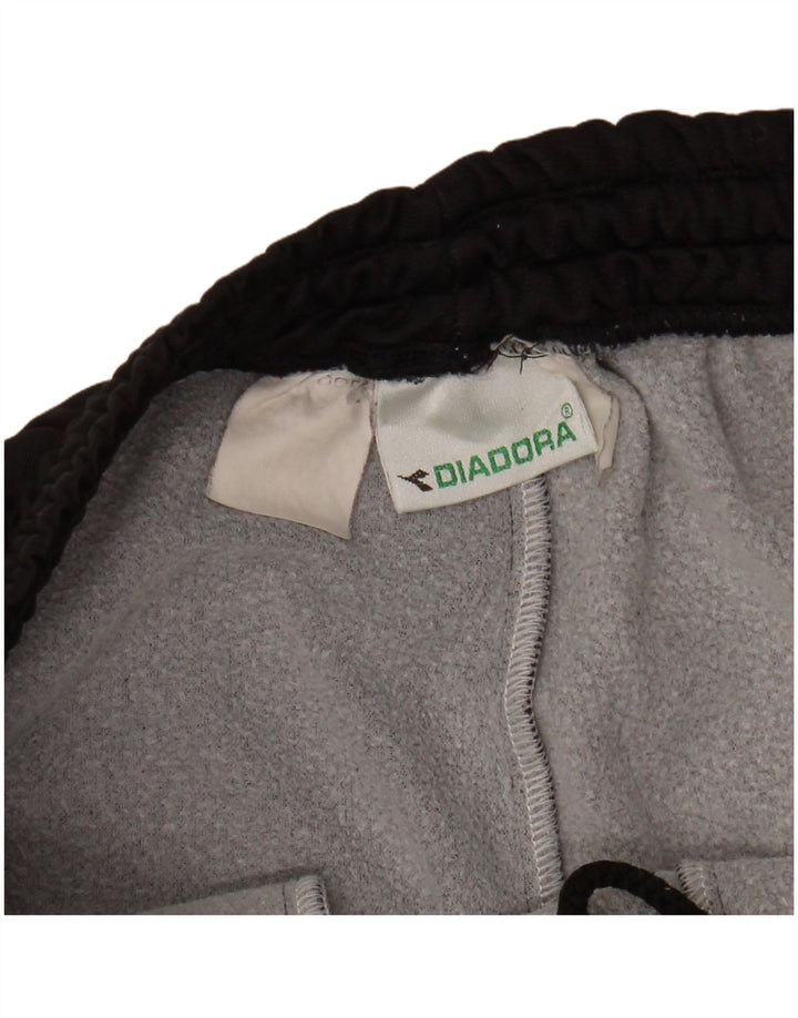Męskie spodnie dresowe DIADORA, duże, czarne, z blokami kolorów