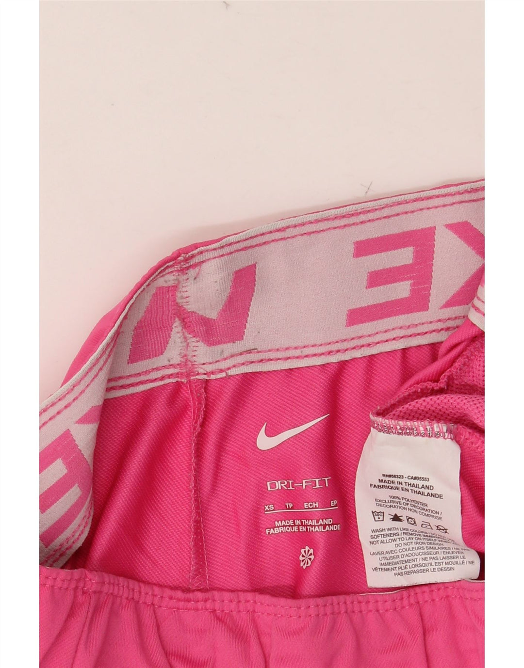 Damskie spodenki sportowe NIKE Dri Fit UK 4 XS Różowy poliester