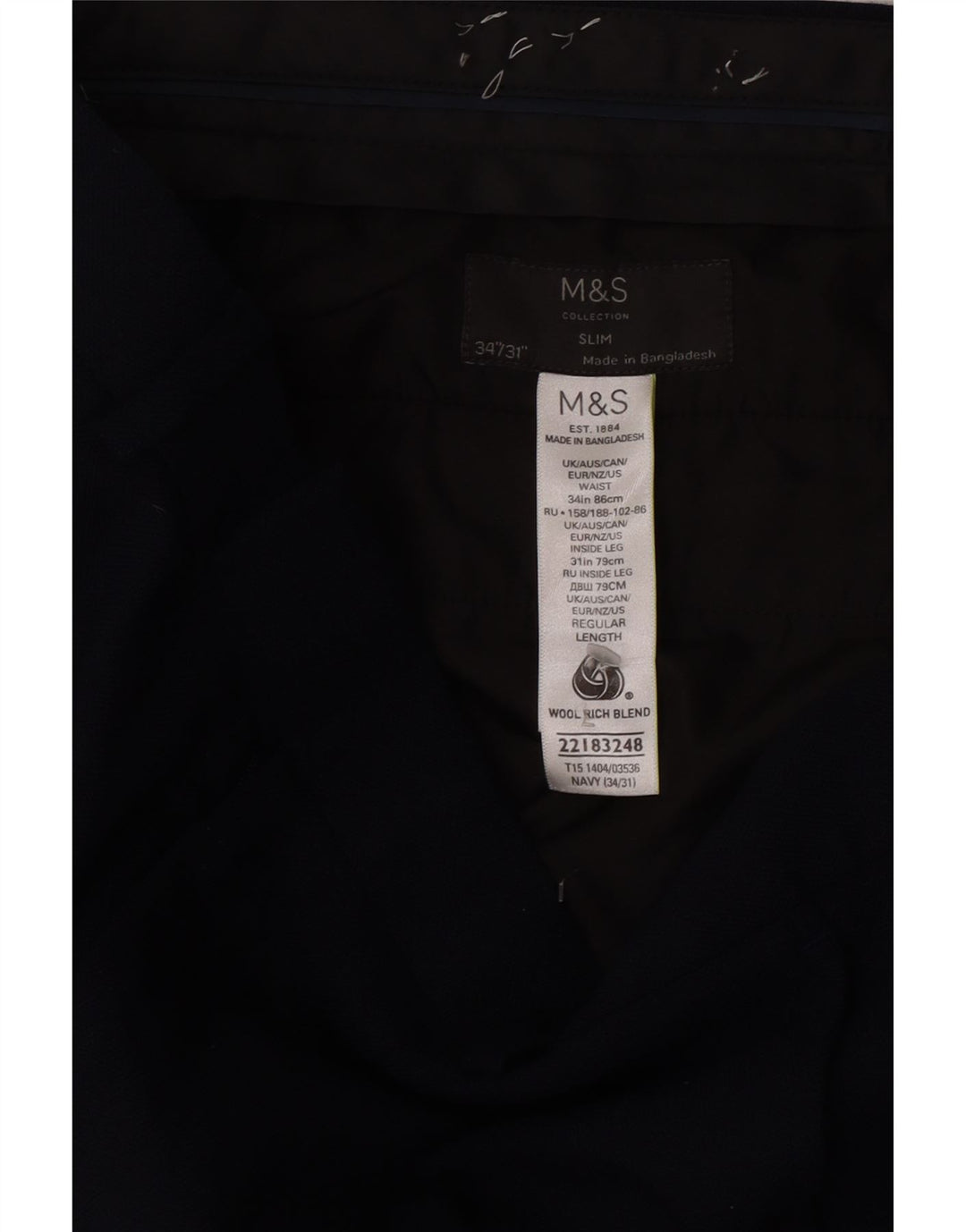 Męskie spodnie garniturowe Marks & Spencer W34 L31 Granatowo-wełniane