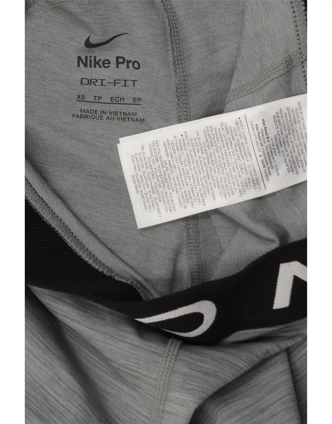 Damskie legginsy NIKE Dri Fit Graphic UK 4 XS Szary, nakrapiany poliester