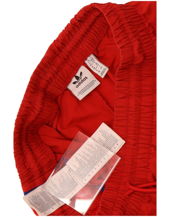 Damskie spodnie dresowe Adidas Joggers UK 10 Small Red Poliester