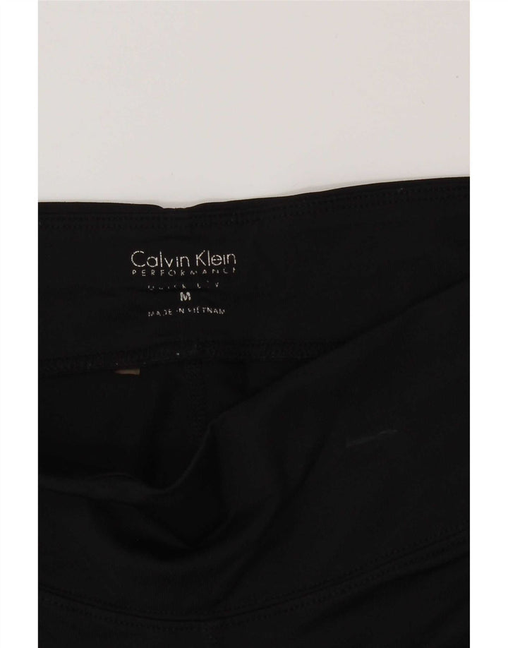 Damskie legginsy Capri Calvin Klein UK 12, średnie czarne
