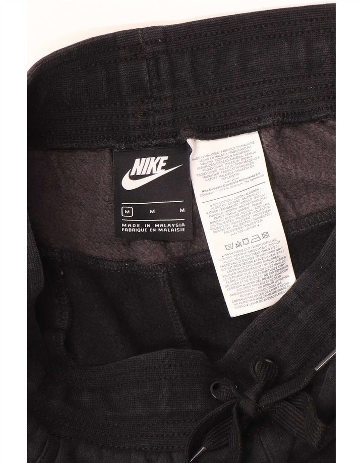 Męskie spodnie dresowe Nike Graphic Tracksuit Joggers w kolorze średniej czerni