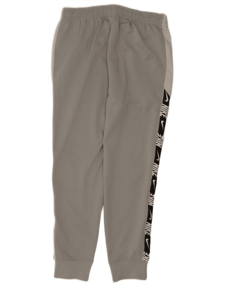 Męskie spodnie dresowe Nike Graphic Dresy Joggery w kolorze średnioszarym