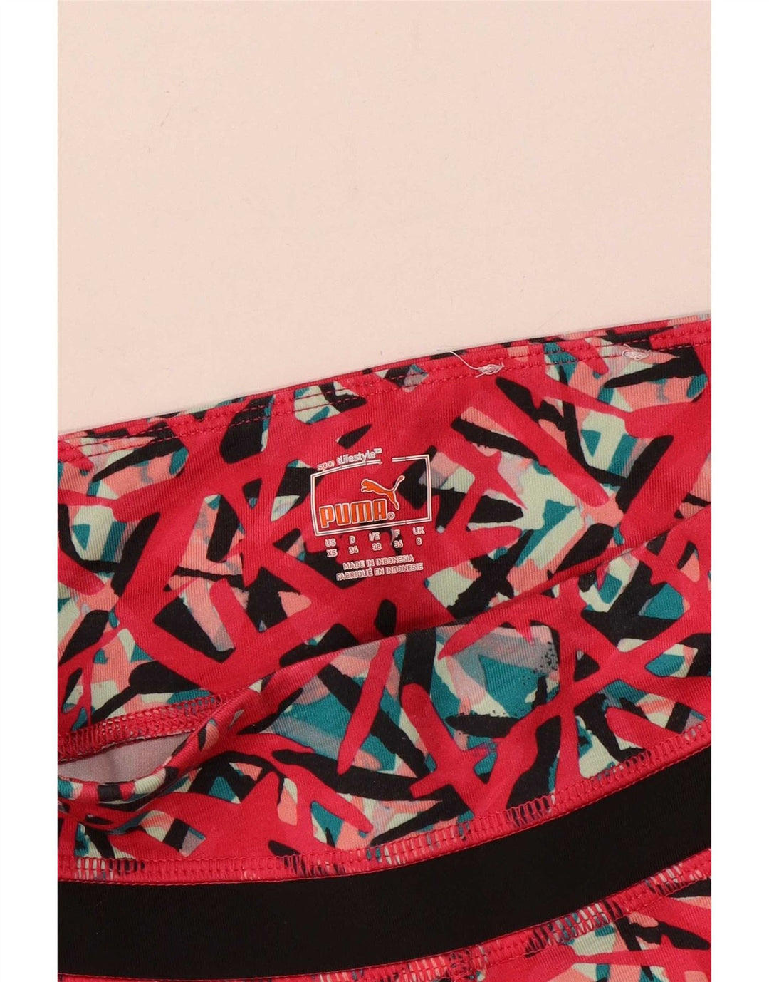 Damskie legginsy Capri Puma UK 8 Małe różowe geometryczne
