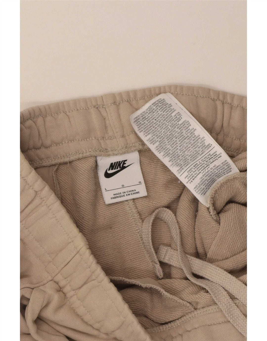 Męskie spodnie dresowe Nike, duże, beżowe, bawełniane