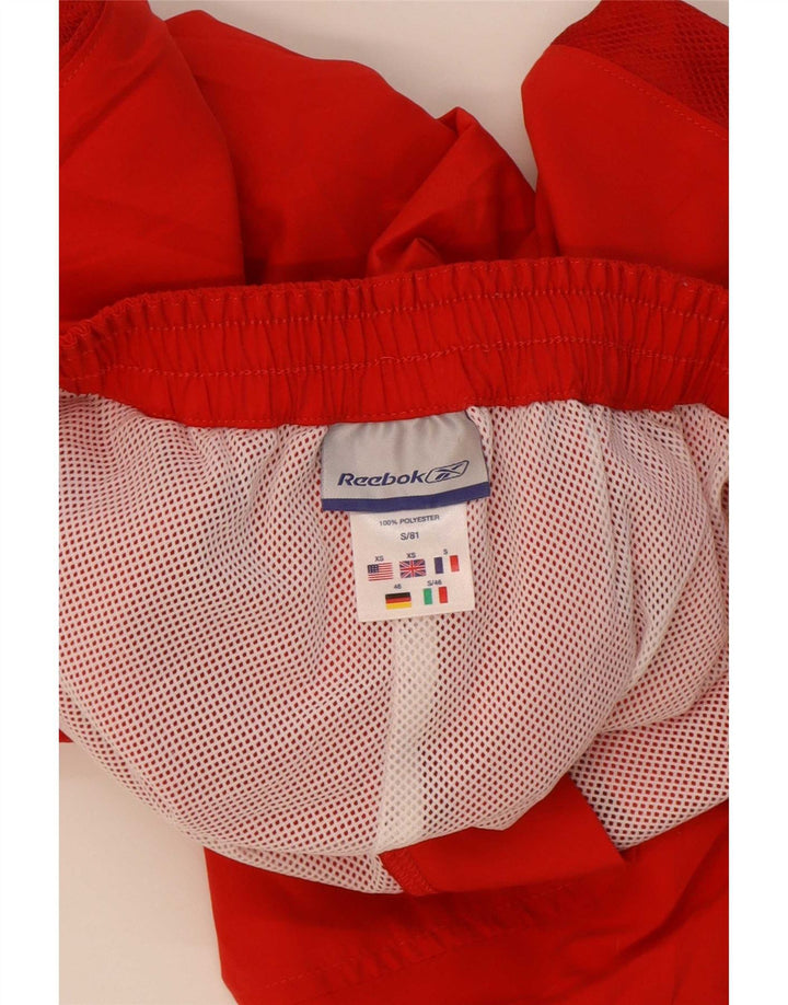Męskie spodnie dresowe Nike Capri, małe, czerwone, z poliestru w blokach kolorów