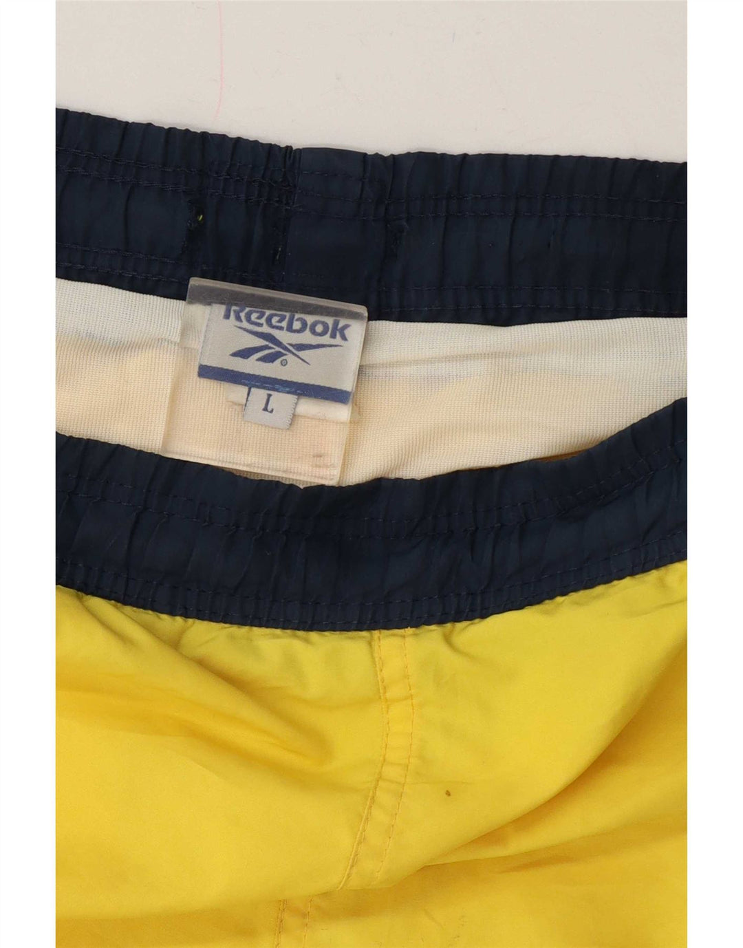 Męskie spodenki sportowe Reebok, duże, żółte, z blokami kolorów