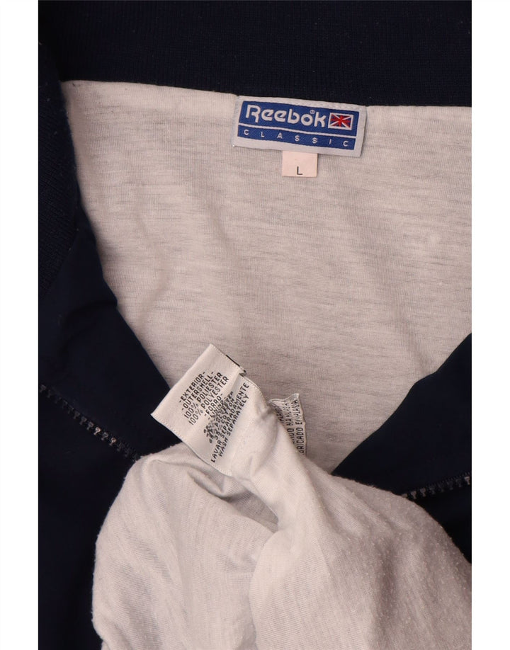 Męska kurtka dresowa Reebok z grafiką, duża, granatowa, z blokami kolorów