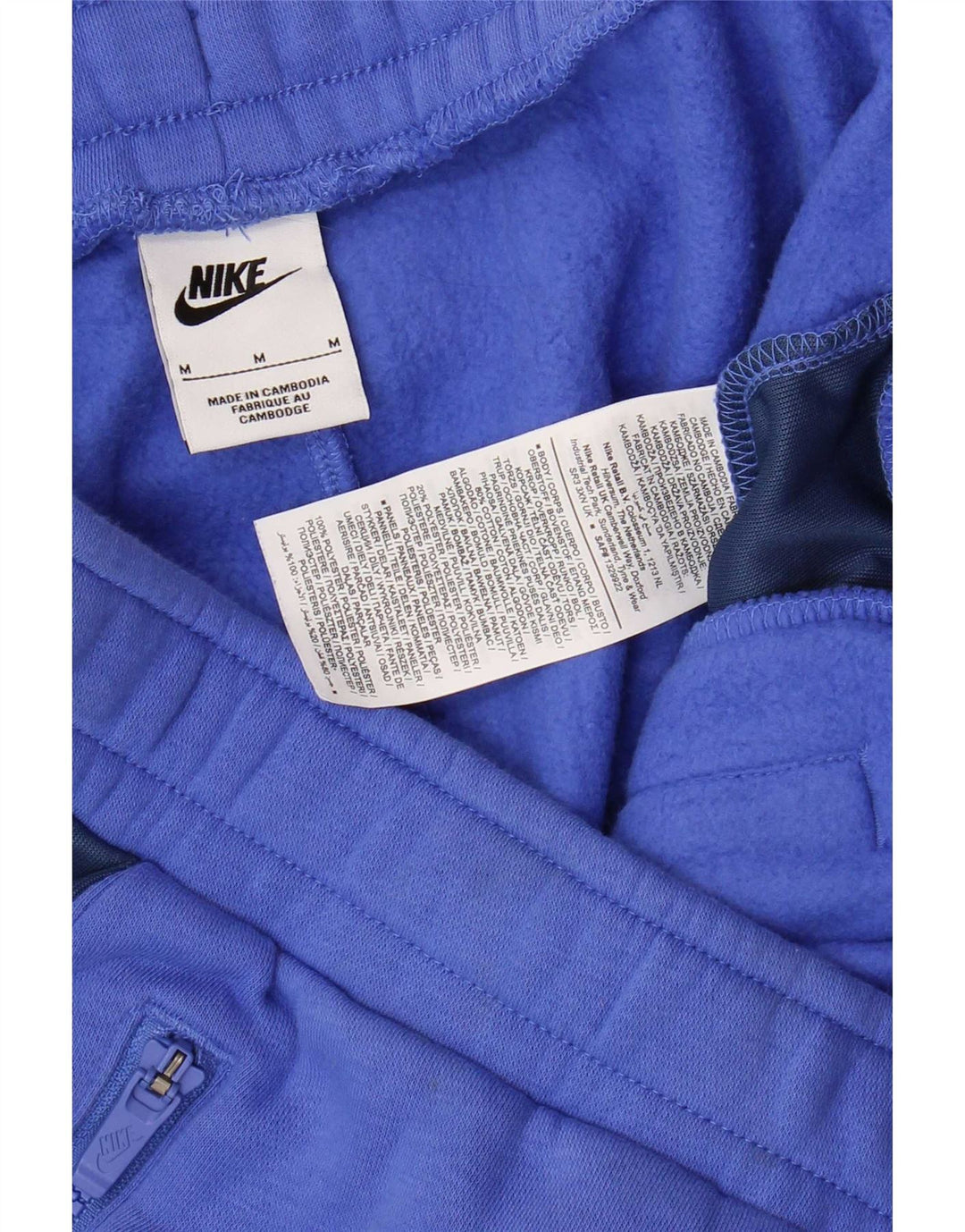 Męskie spodnie dresowe Nike, joggery, bawełna w kolorze średniego błękitu