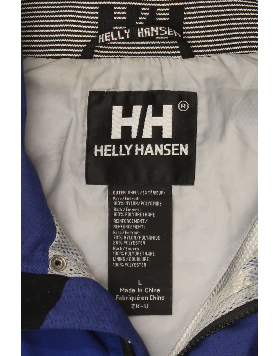 Męska kurtka przeciwdeszczowa Helly Hansen Graphic UK 40, duża niebieska nylonowa z blokami kolorów