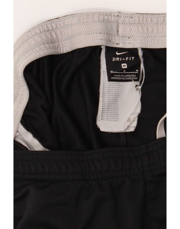 Męskie spodnie dresowe Nike Dri Fit, poliester w kolorze średniej czarnej kolorystyki