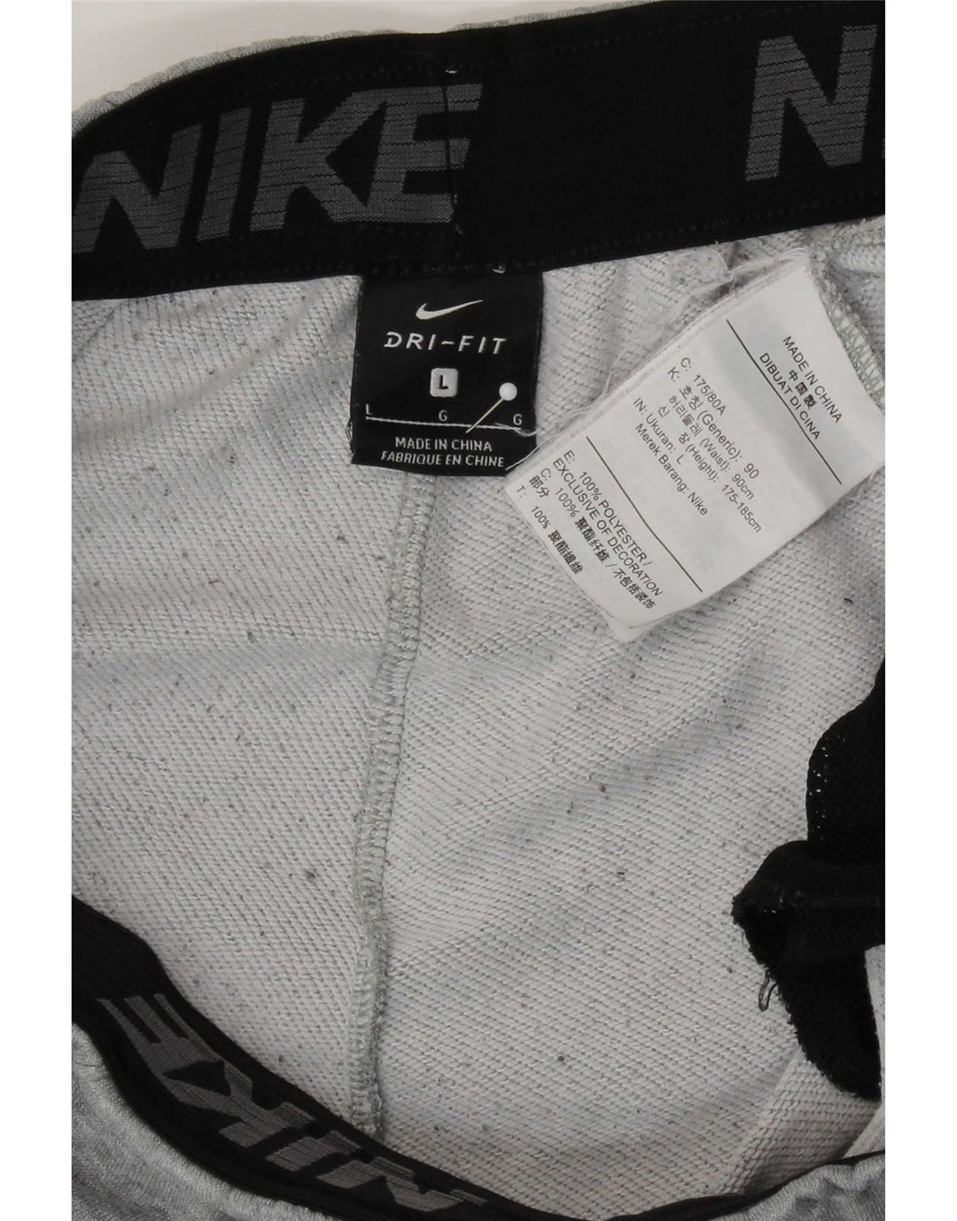 Męskie spodnie dresowe Nike Dri Fit Graphic, duże, szare, poliestrowe