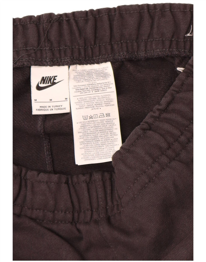 Męskie spodnie dresowe Nike Graphic Tracksuit Joggers w kolorze średniej czerni