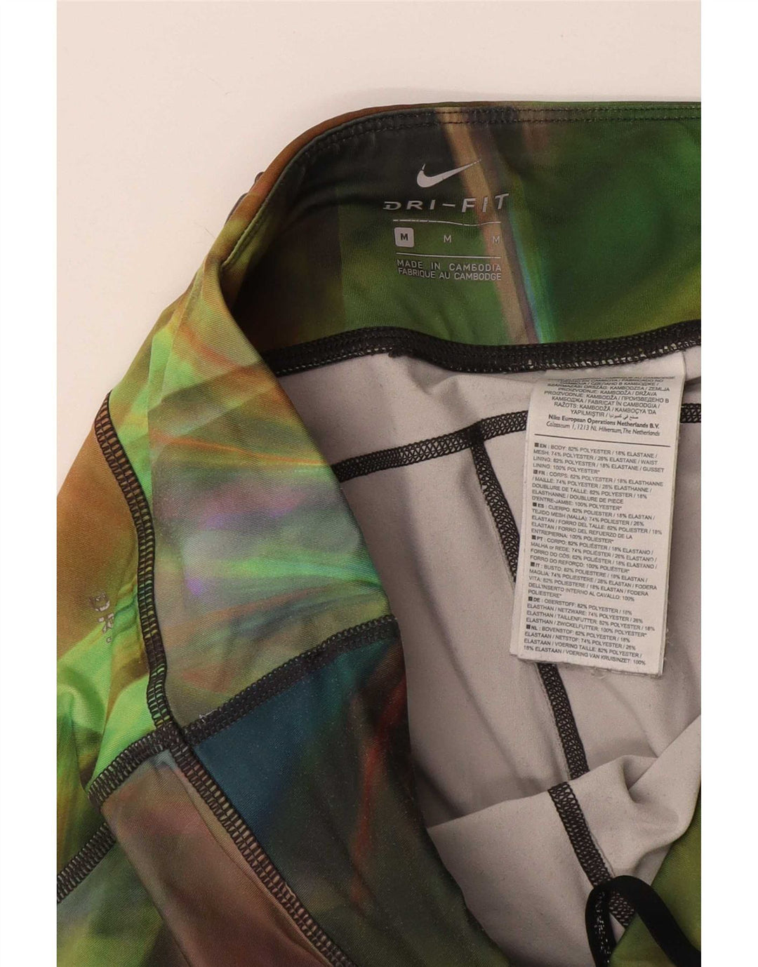 Damskie legginsy Nike Dri Fit Capri UK 14 Średni wielokolorowy krawat