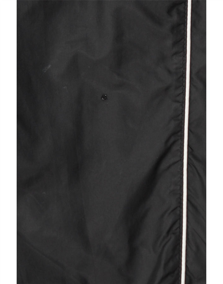 Wodoodporne spodnie damskie Nike o luźnym kroju UK 14, średni czarny nylon