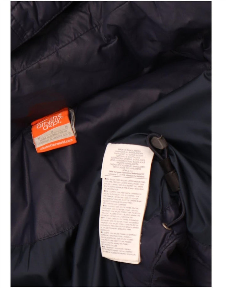 Damska wyściełana kurtka z kapturem NIKE UK 14 Średni granatowy nylon w bloki kolorów