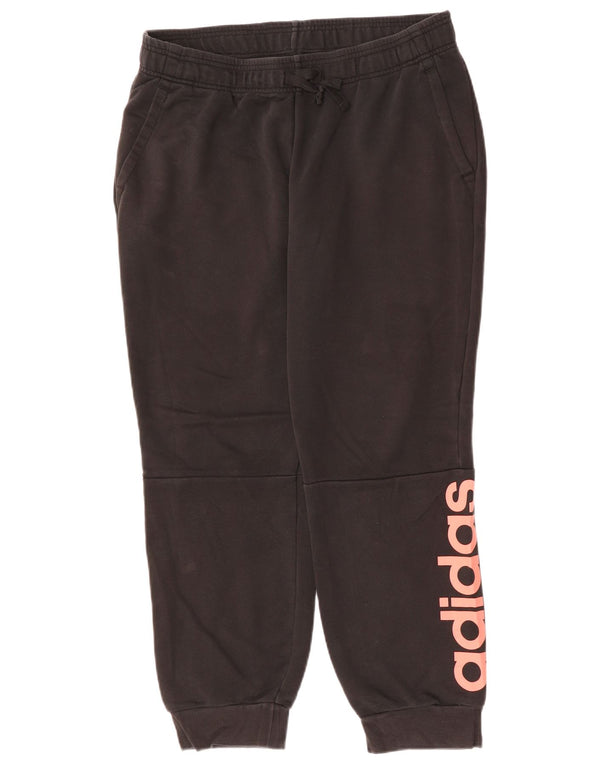 Damskie spodnie dresowe ADIDAS z grafiką Joggers UK 20/22 XL, czarna bawełna