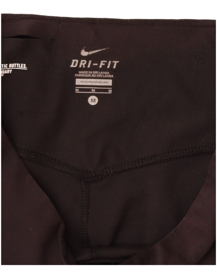 Damskie legginsy Nike Dri Fit Capri UK 12, średni czarny poliester