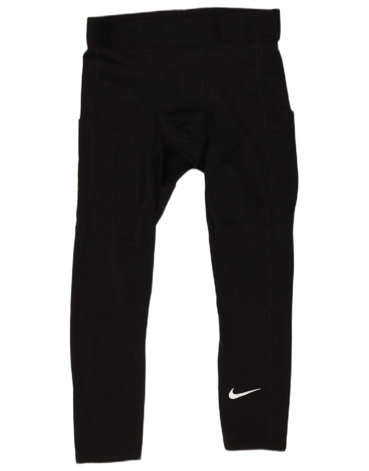 Damskie legginsy Nike Tight Fit UK 12, średni czarny poliester
