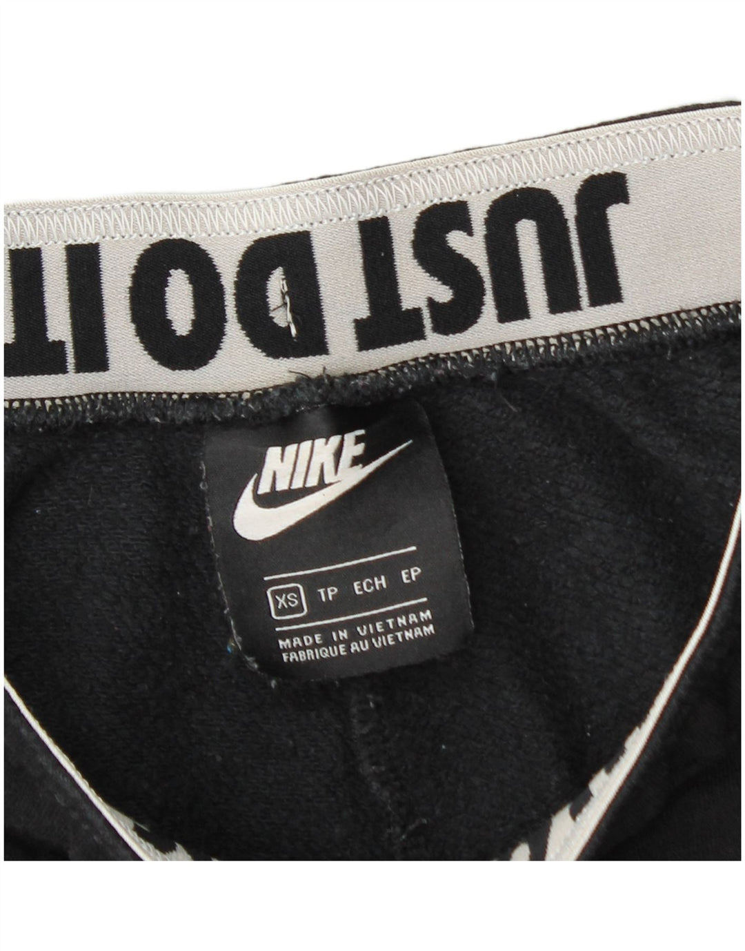 Damskie spodnie dresowe NIKE Graphic Joggers UK 4 XS, czarne, bawełniane