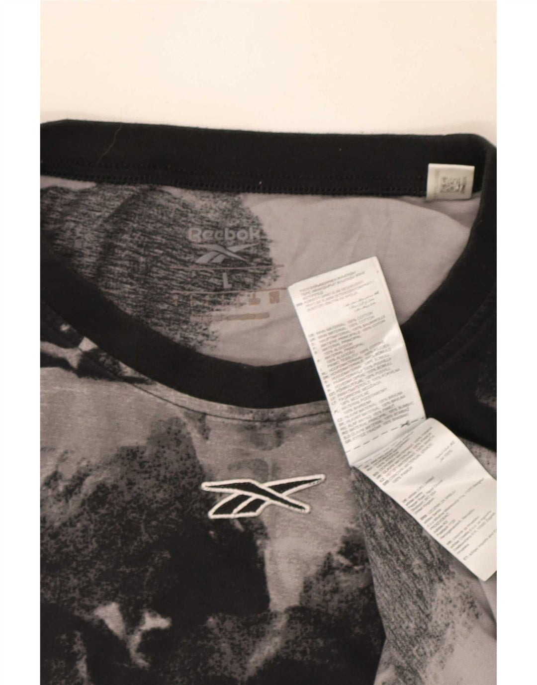 Męska koszulka Reebok z abstrakcyjnym wzorem, duża, czarna, bawełniana