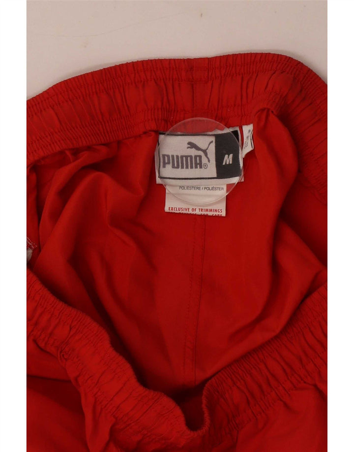 Męskie spodnie dresowe Puma Graphic Capri, średni czerwony poliester