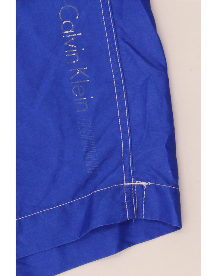 Męskie spodenki kąpielowe Calvin Klein XL, niebieski, poliester z blokami kolorów