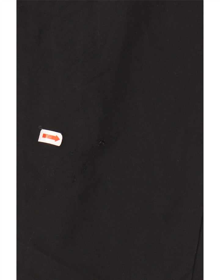 Męskie spodnie dresowe NIKE Dri Fit, duży, czarny poliester z blokami kolorów