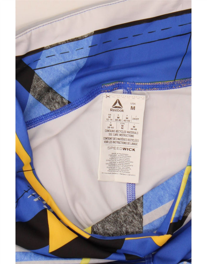 Legginsy damskie REEBOK UK 12/14 Średni niebieski geometryczny poliester