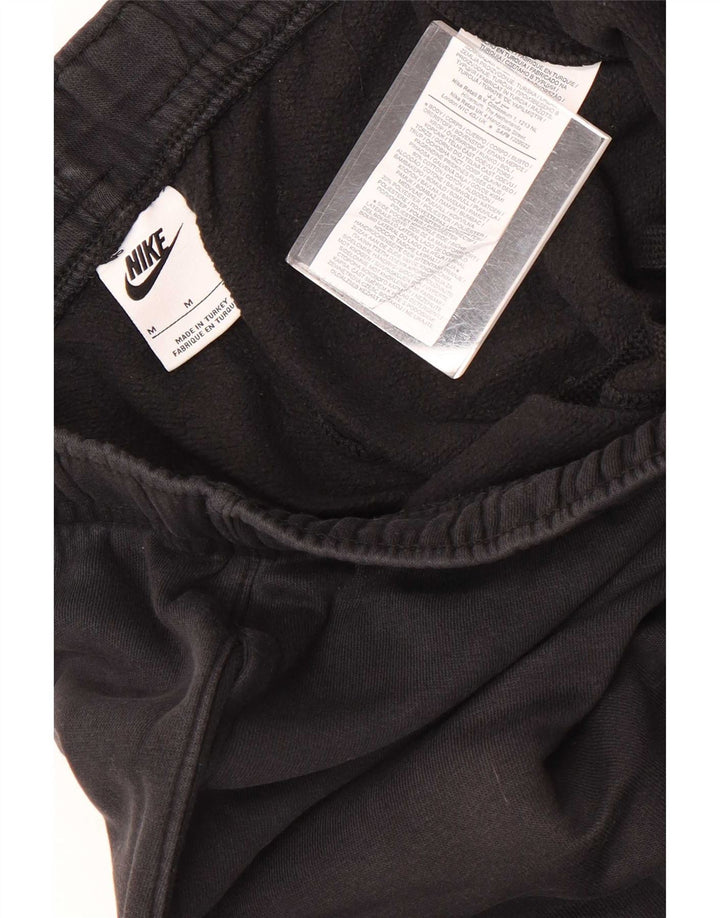 Męskie spodnie dresowe Nike Graphic Joggers, średnia czarna bawełna