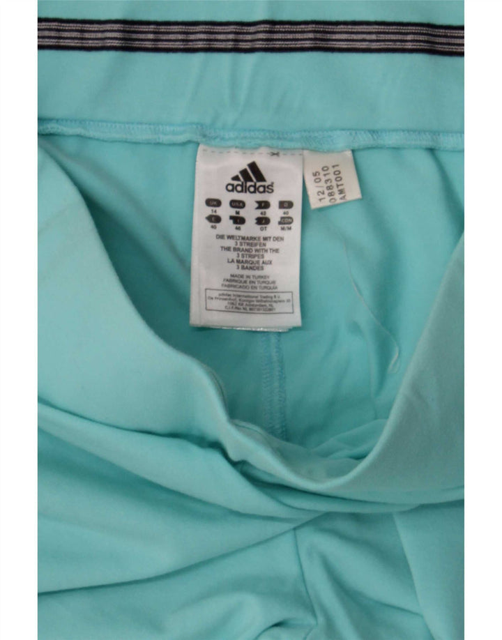 Damskie spodnie dresowe Adidas Regular, średnia turkusowa bawełna