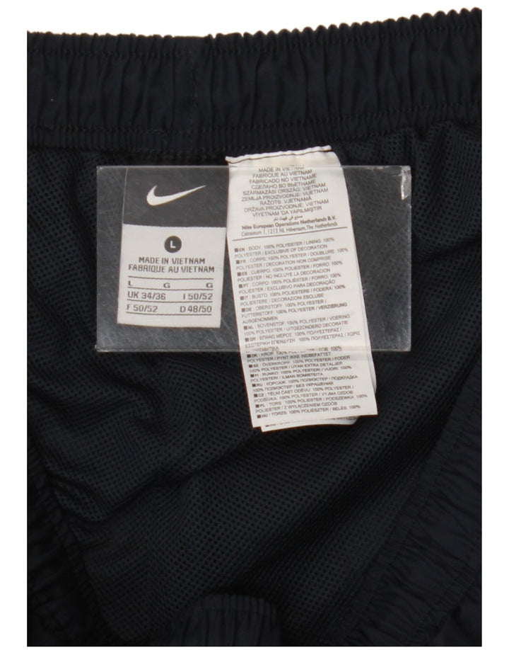 Męskie spodnie dresowe Nike, duże, granatowe, z blokami kolorów, poliestrowe