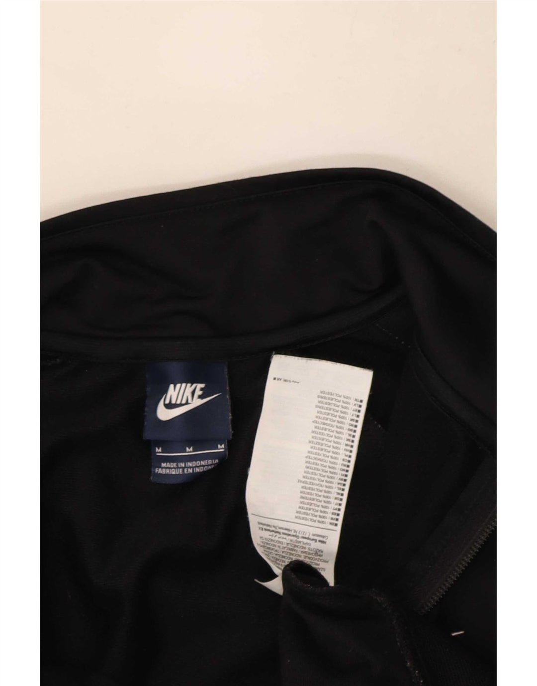 Męska kurtka dresowa Nike, średnia czarna, poliestrowa z blokami kolorów